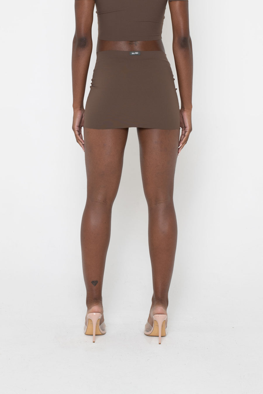 BROWN SLINKY LOW RISE MINI SKIRT