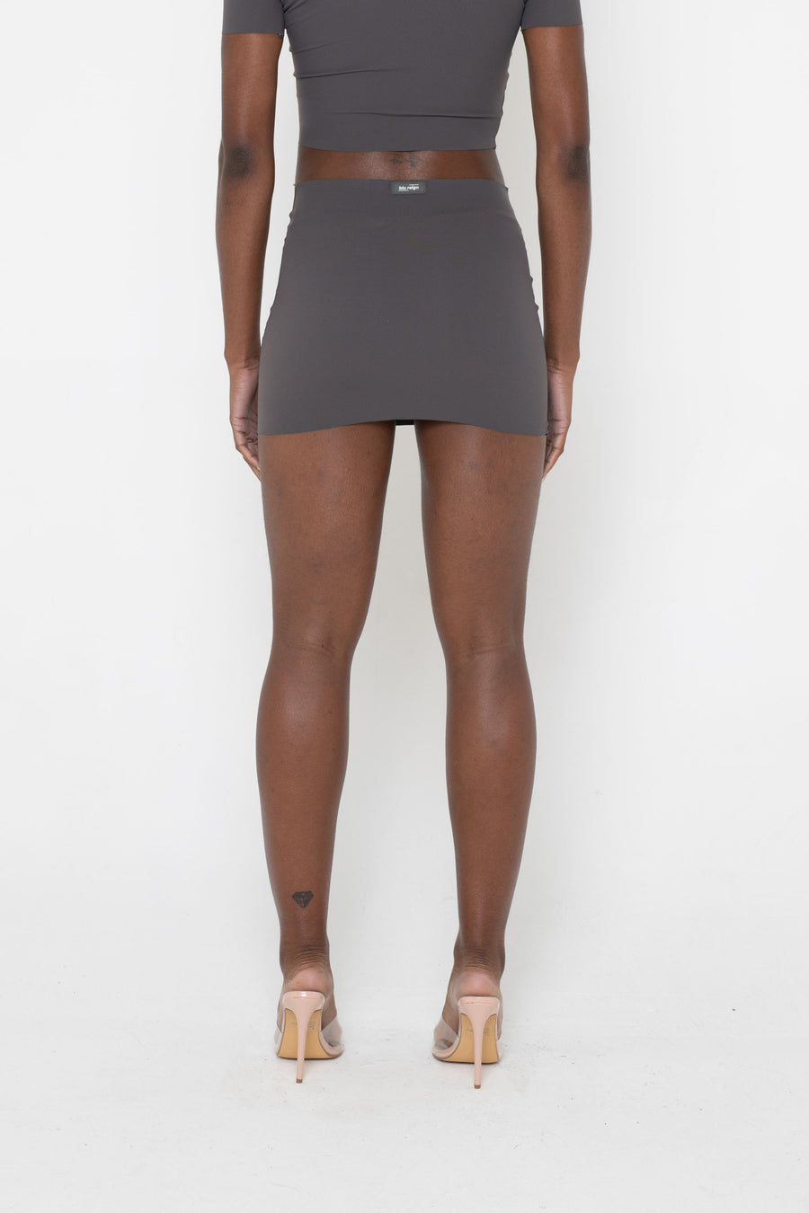 CHARCOAL SLINKY LOW RISE MINI SKIRT